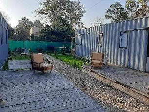 En zona barrio de Los Laureles Lujan quinta con garage en venta.