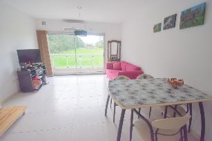 Venta de departamento en estado bueno en zona barrio de Altos de Hudson II Countries y Barrios Cerrados.